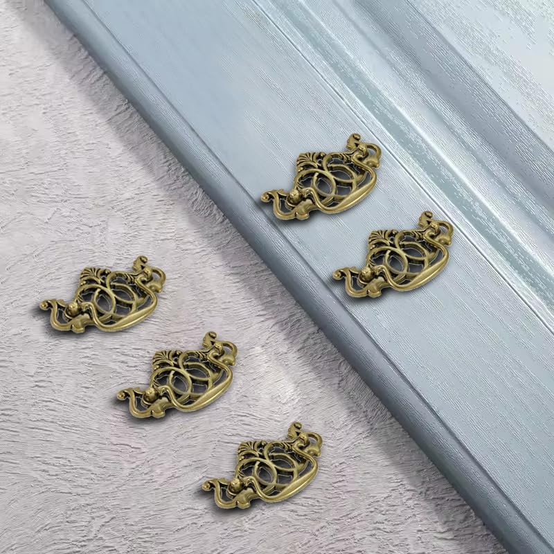 Multiple Silverline B2001 Bail Pulls installed on cabinet drawers