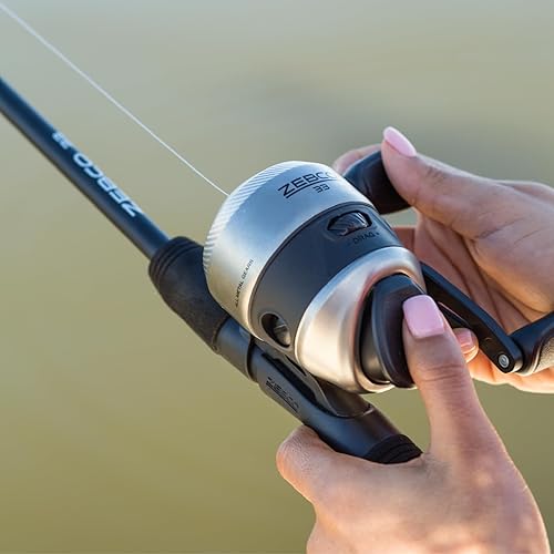 Miniatura 7 de Zebco 33 Spincast Reel and Fishing Rod Combo, 6-Foot 2-Piece Fiberglass Rod with EVA Handle, Quickset Anti-Reverse Fishing Reel with Bite Alert