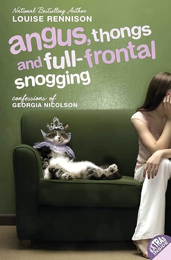 Angus, Thongs, and Full-Frontal Snogging book cover with a green wall and a green couch with a cat in a bib and tiara and a young girl with her hand resting on her face facing away from the cat. Her face is hidden.