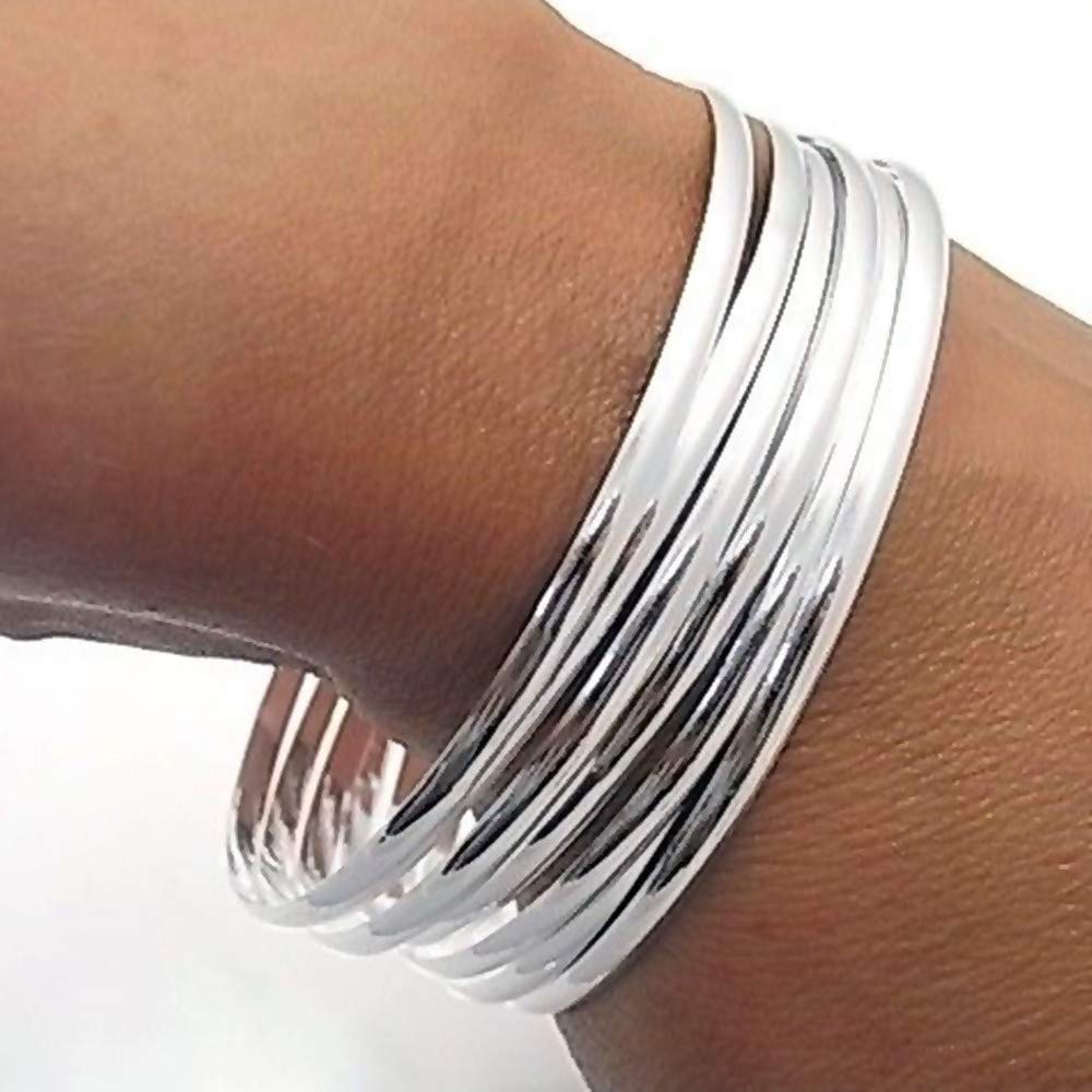 Pulsera aro plata Ley 925m mujer semanario media caña liso 7 aros diámetro 65mm. ancho 3mm.