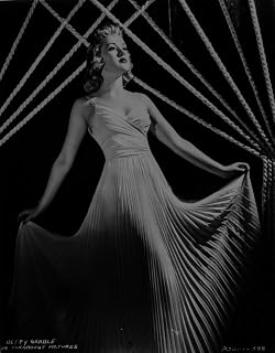 Betty Grable Post in a White Dress Photo Print (24 x 30)