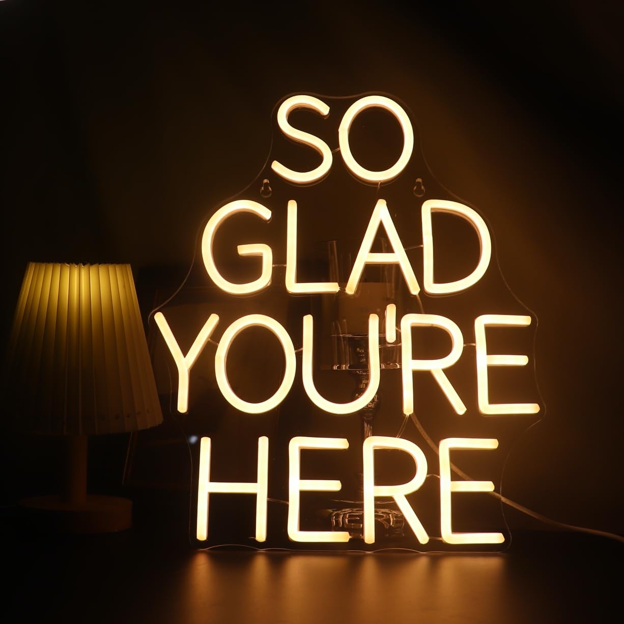 Photo 1 of QiaoFei LED "So Glad You Are Here" Neon Sign Pink Word/Letters USB Powered Neon Lights for Bar Coffee Room Home Art Wall Decor ? Birthday/Wedding Party Window Living Room Decor(Warm white)