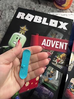 Amazon.com: Roblox Action Collection - Advent Calendar [Includes 2  Exclusive Virtual Items] : Home & Kitchen