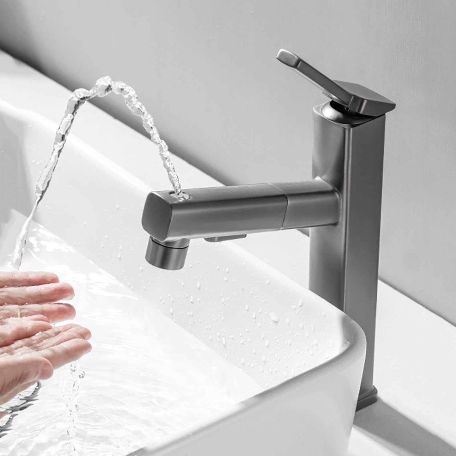 Mitigeur lavabo haut avec douchette extractible pour laver les cheveux facilement