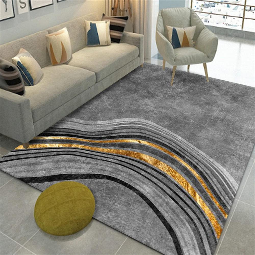 Tapis design moderne gris et doré pour sublimer votre séjour