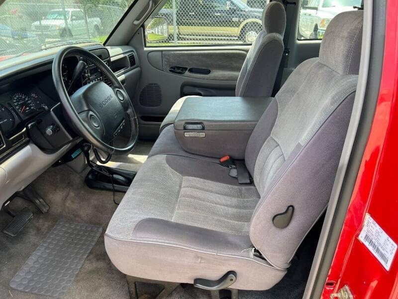 Durafit Seat Covers, Compatible with 1994-2000 Ram 1500 SL Model Regular and Extended Cab 40/20/40 with Rounded Shoulders and Manual Controls Exact Fit Seat Covers Made in Dark Gray Leatherette.