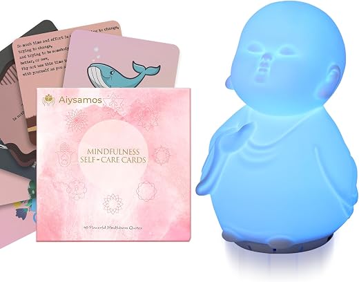 Breathing lamp displayed beside affirmation cards
