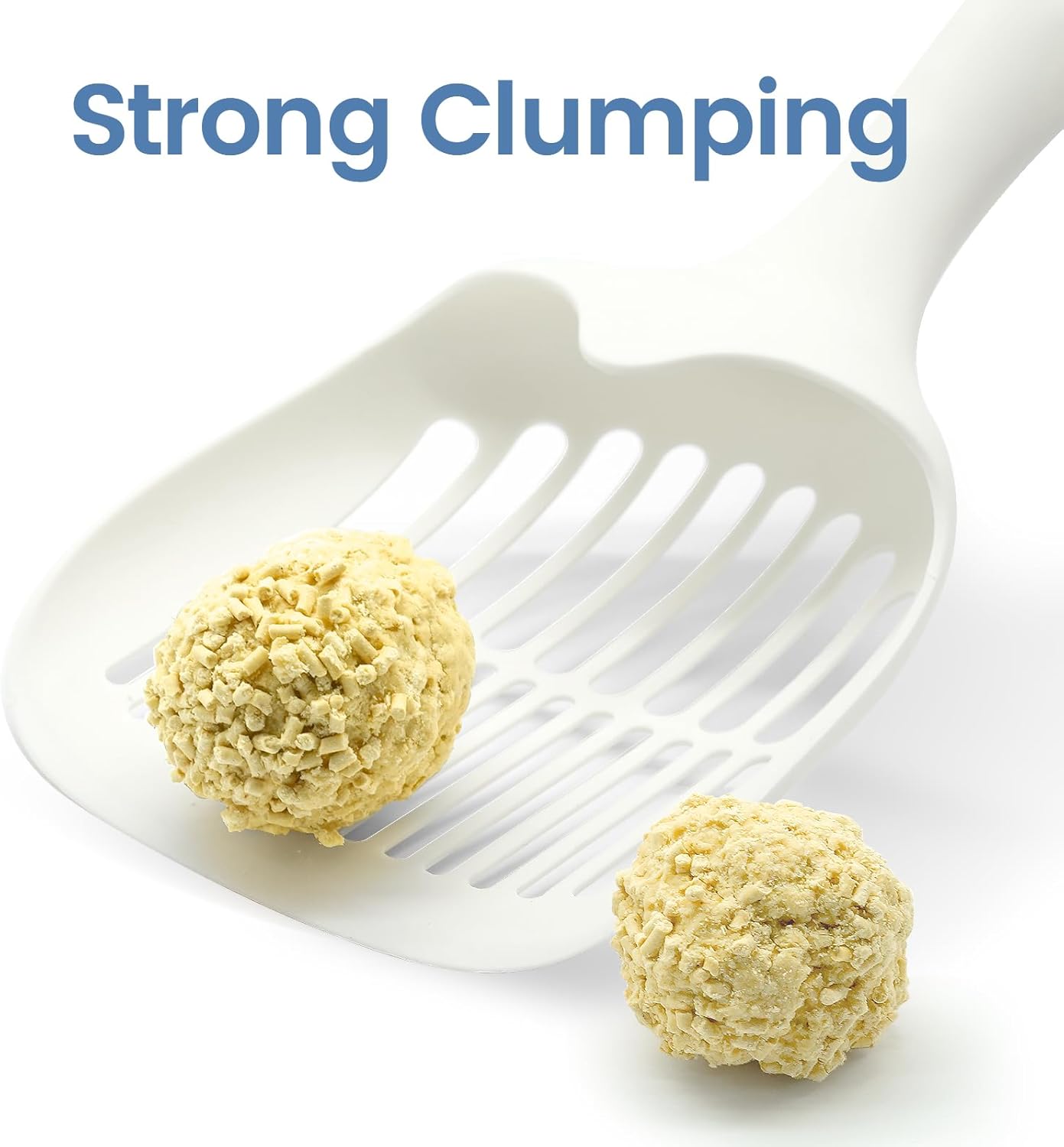 Two tightly clumped balls of LELO ELVES Tofu Cat Litter on a white litter scoop.