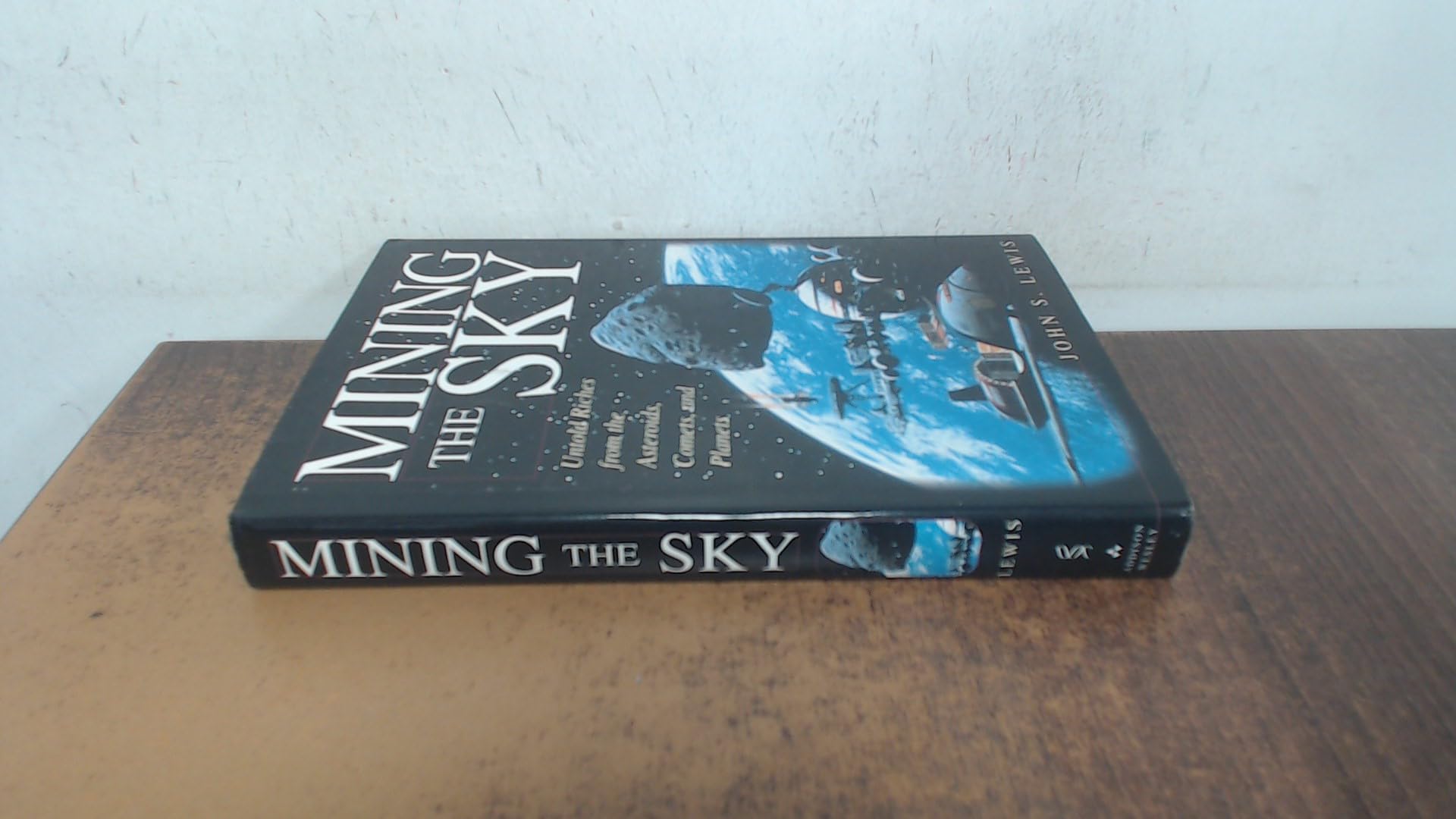 Mining the Sky: Untold Riches from the Asteroids, Comets, and Planets [Hardcover] Lewis, John S.
