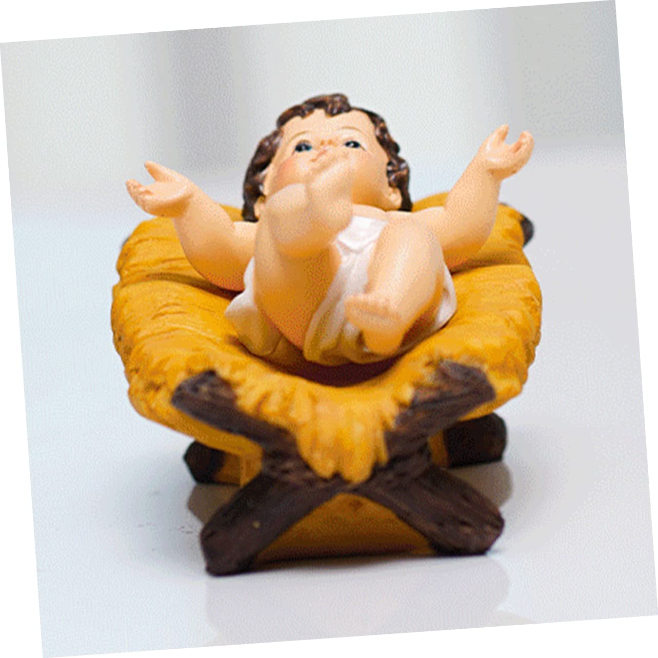 Krippenmodell Mini Krippe Figur im Bett Kleine Krippenfigur Christus Herr Heilige Religiöse Religiöse Skulptur Harz Zarte Baby
