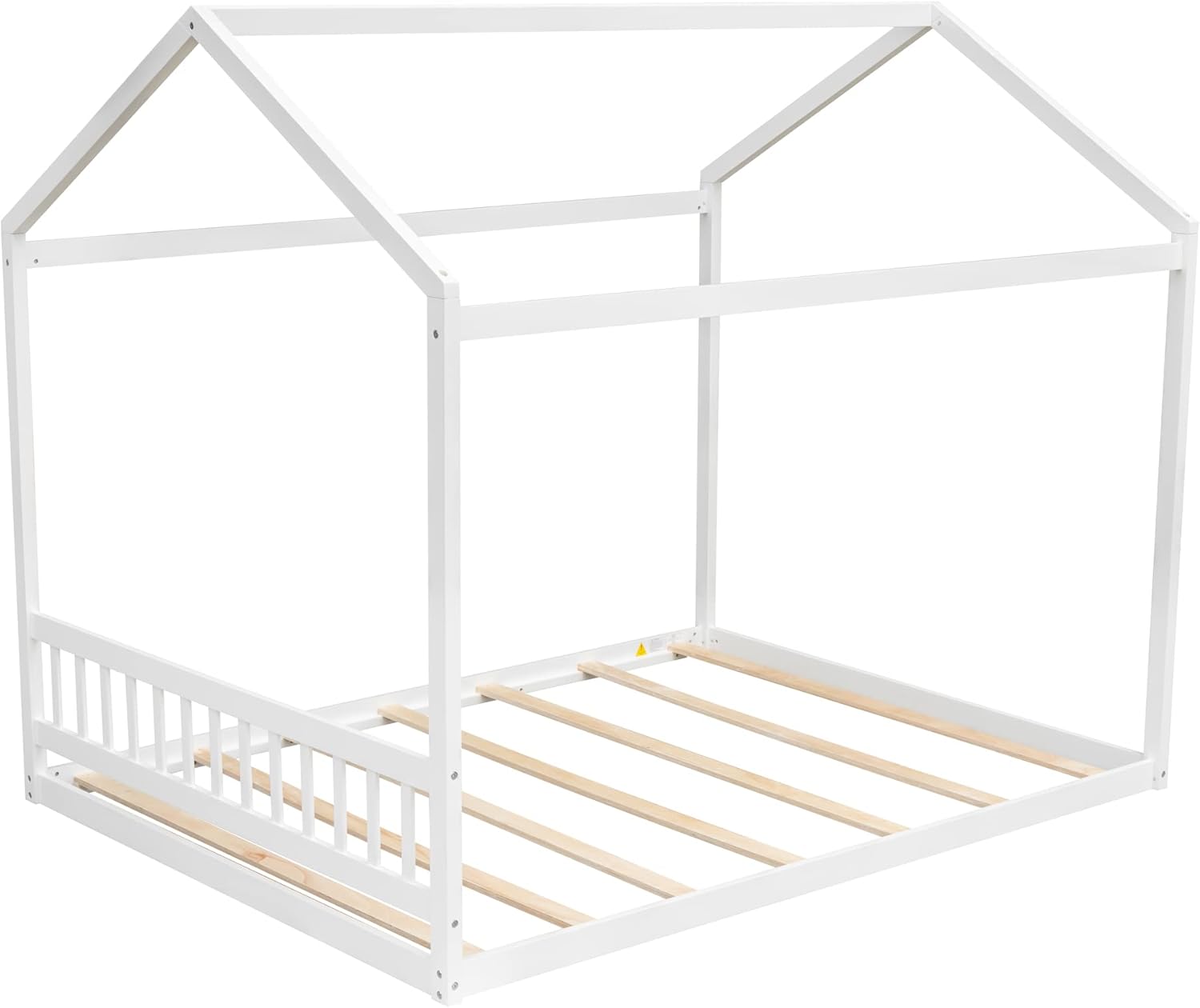 Disassembled white wooden house bed frame components, including side rails, headboard, footboard, and roof frame pieces, laid out on a floor.