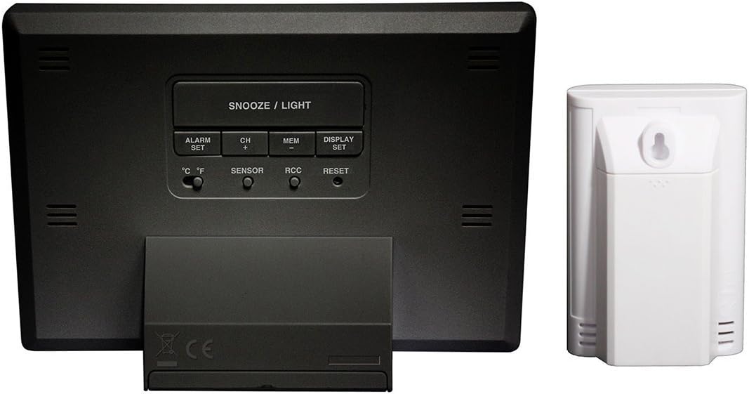 Rear view of the Youshiko YC9350 main unit showing control buttons and battery compartment, next to the rear view of the YC9311 wireless sensor with its battery compartment and mounting hole.