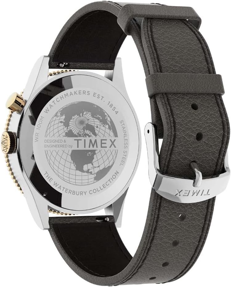 Close-up of the watch's stainless steel case back, featuring engravings of 'TIMEX', 'WATERBURY COLLECTION', 'WR 100M', and 'STAINLESS STEEL'.