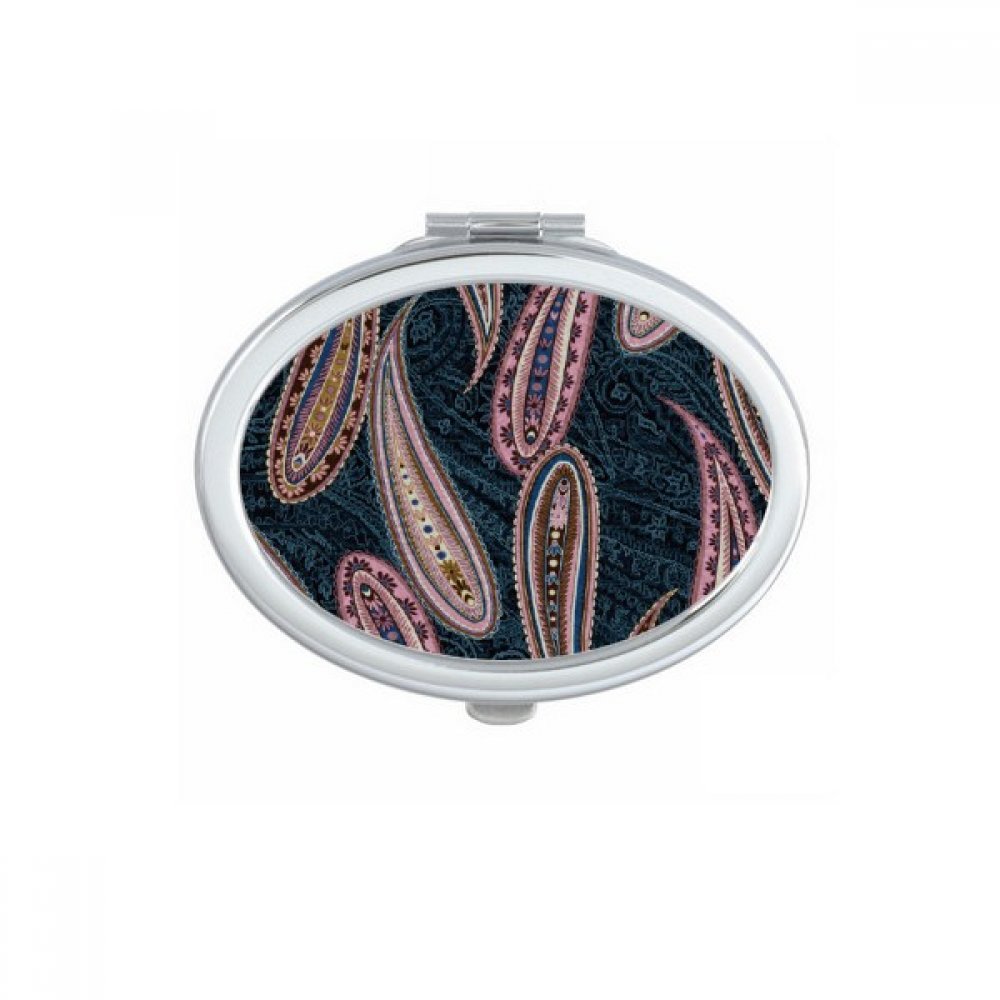 Miroir de poche à la main motif fleur rouge pour retouches maquillage en voyage ou au bureau