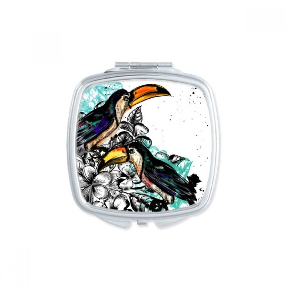 Miroir compact oiseau tropical Toco pour retouches maquillage en voyage