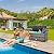 YITAHOME 90 Gallon Outdoor Wicker Storage Bench w/Cushion, Large PE Rattan Deck Storage Box w/Handles & Hydraulics for Patio Furniture, Cushions, Garden Tools, Pool & Sports Equipment, Gray