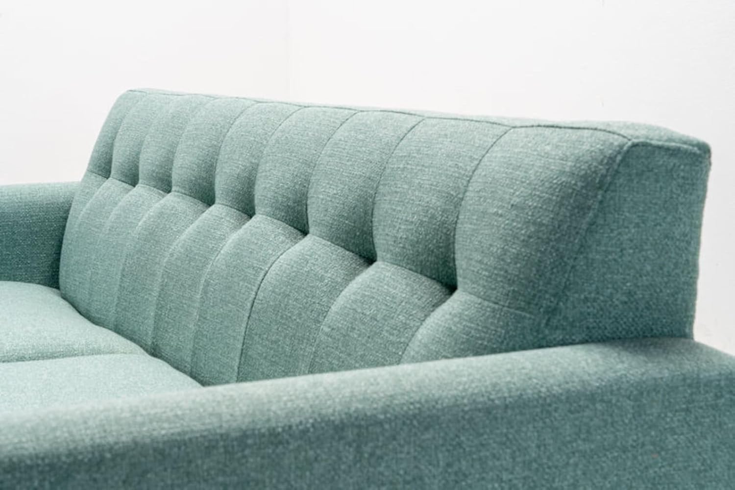 Sofa Made of Solid Wood and Light Green Fabric, a mid-Century Modern Minimalist Style Sofa, Often Used in The Living Room and Study