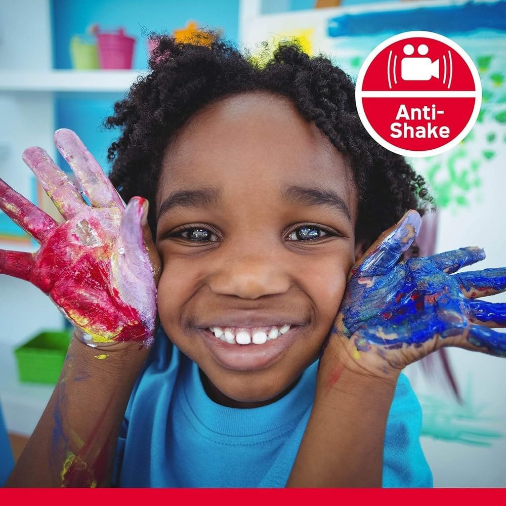 A child with painted hands, with an icon indicating anti-shake feature is active.