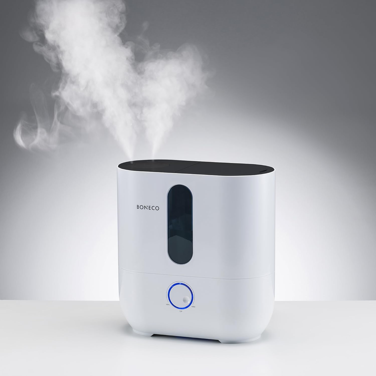 BONECO U310 Humidifier emitting a visible mist from its top vent.