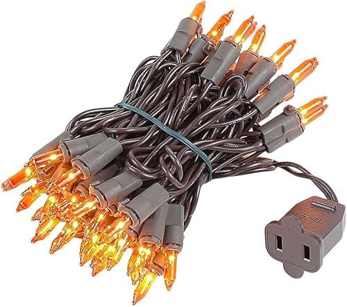Novelty Lights Juego de 50 mini tiras de luces ámbar de Navidad, cable marrón, para interiores y exteriores, certificación UL, 11 pies de largo