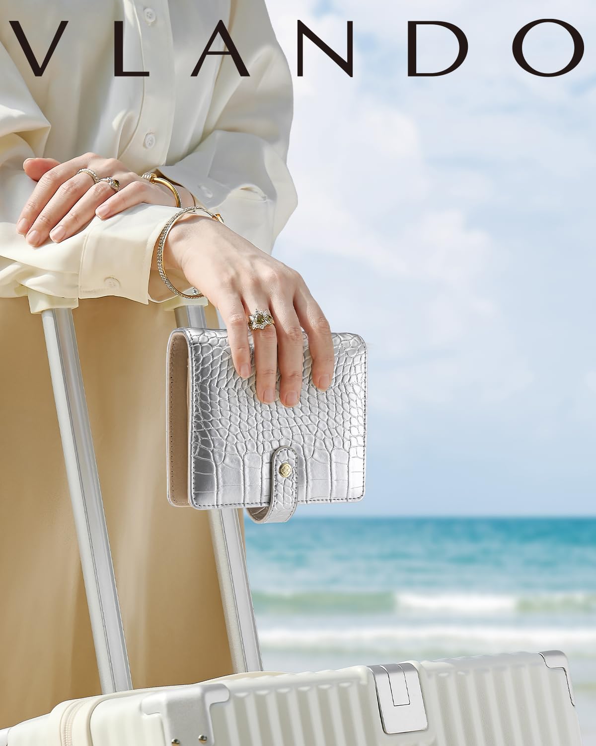 Vlando Estuche organizador de joyas de viaje, regalos de viaje para mujeres, carpeta portátil de almacenamiento de joyas con cremallera transparente, bolsa de terciopelo para joyas, color plateado