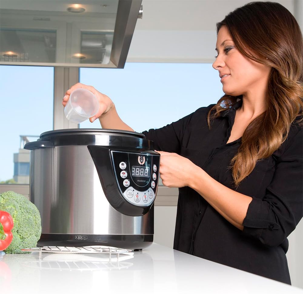 Person adding liquid to the Cecotec Programmable Electric Pot