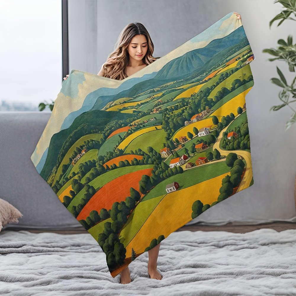 Couverture pour lit et soirées cocooning au motif collines colorées