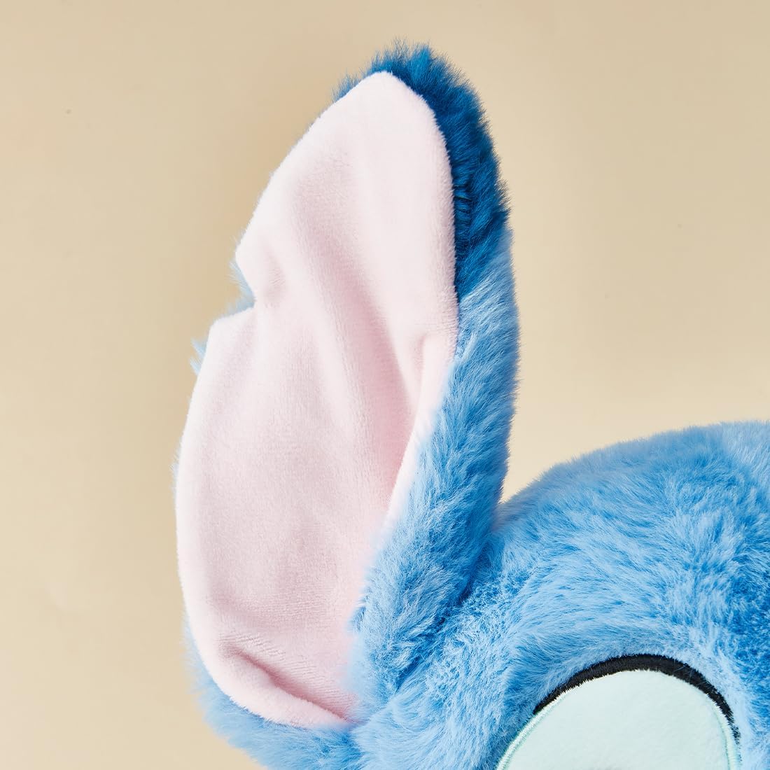 Close-up of the soft fur texture of the Stitch plush toy