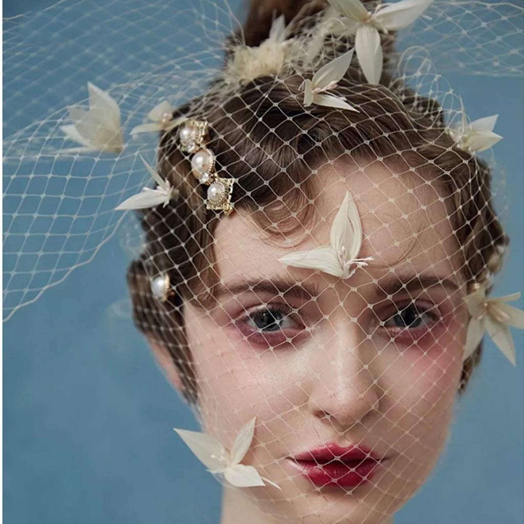 Photo shoot studio réussi grâce au voile coupe de cheveux perle JFDBGU