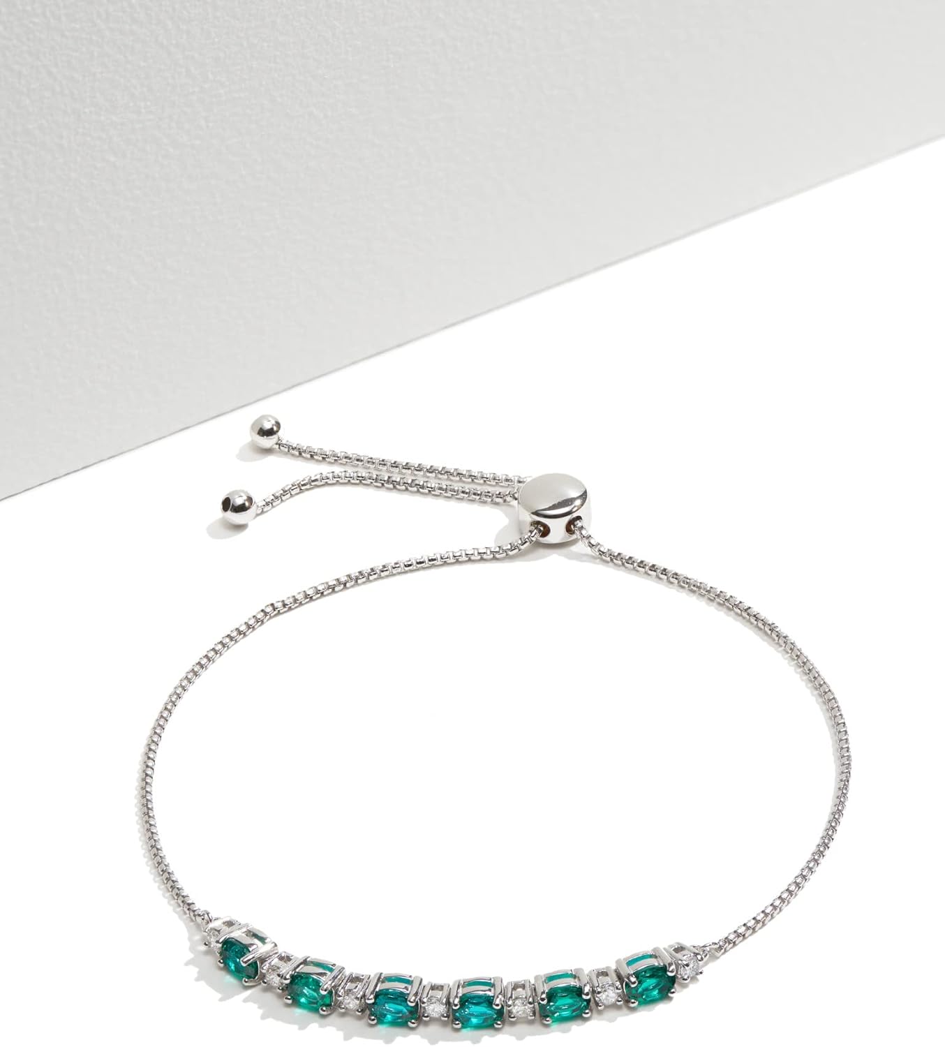 Amazon Essentials 0.175 cttw Lab Grown Diamond and Created Emerald 925 Sterling Silver Bar Bolo Adjustable Bracelet (H-I Color, I1 Calarity)
