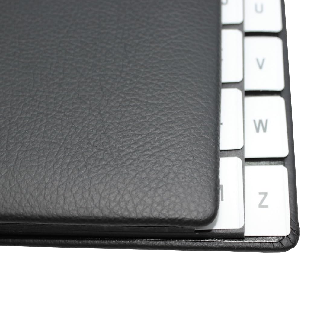 Raccoglitore con registro A-Z, in pelle bovina grana nera, adatto per DIN A4, copertina morbida con dorso elastico, divisori in cartone nero con fori di visualizzazione