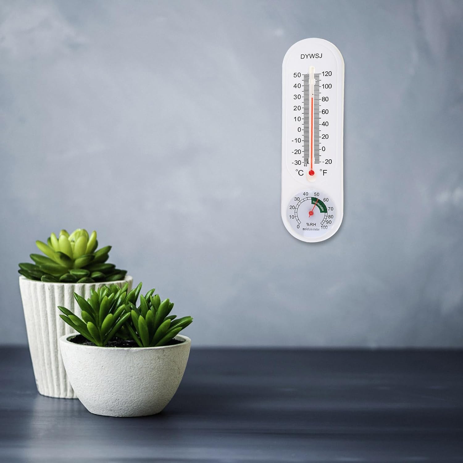 Close-up of the COOLHOOD Wall Thermometer's temperature scale, showing the red liquid indicator.