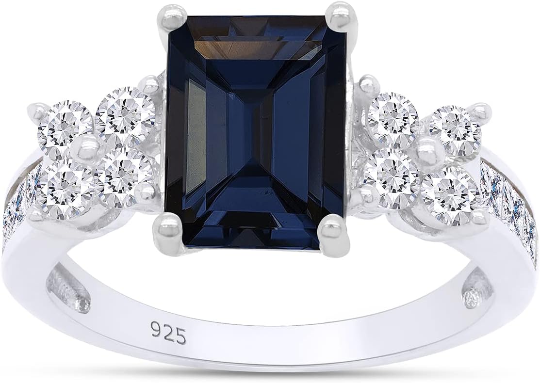 SAVEARTH DIAMONDS 8x6MM Emerald Cut Simulated Blue Sapphire With Princess & Round Cut Sparkling White Cubic Zirconia Cluster Engagement Ring For Women In 14k Gold Over Sterling Silver