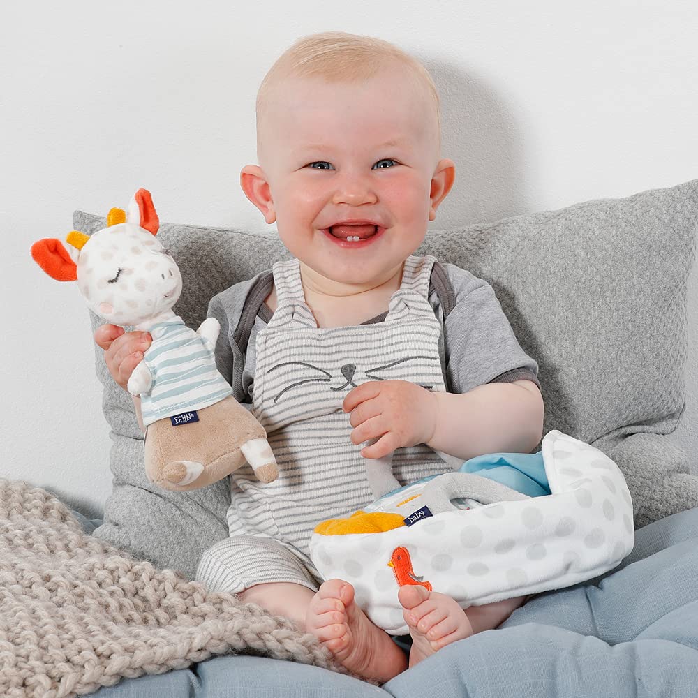Fehn 053166 - Jirafa de peluche con bolsa de transporte y bordado que brilla en la oscuridad, para bebés a partir de 0 meses, tamaño: 23 cm