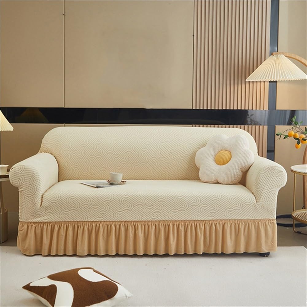 Housse de canapé facile à installer pour rénover un fauteuil abîmé beige