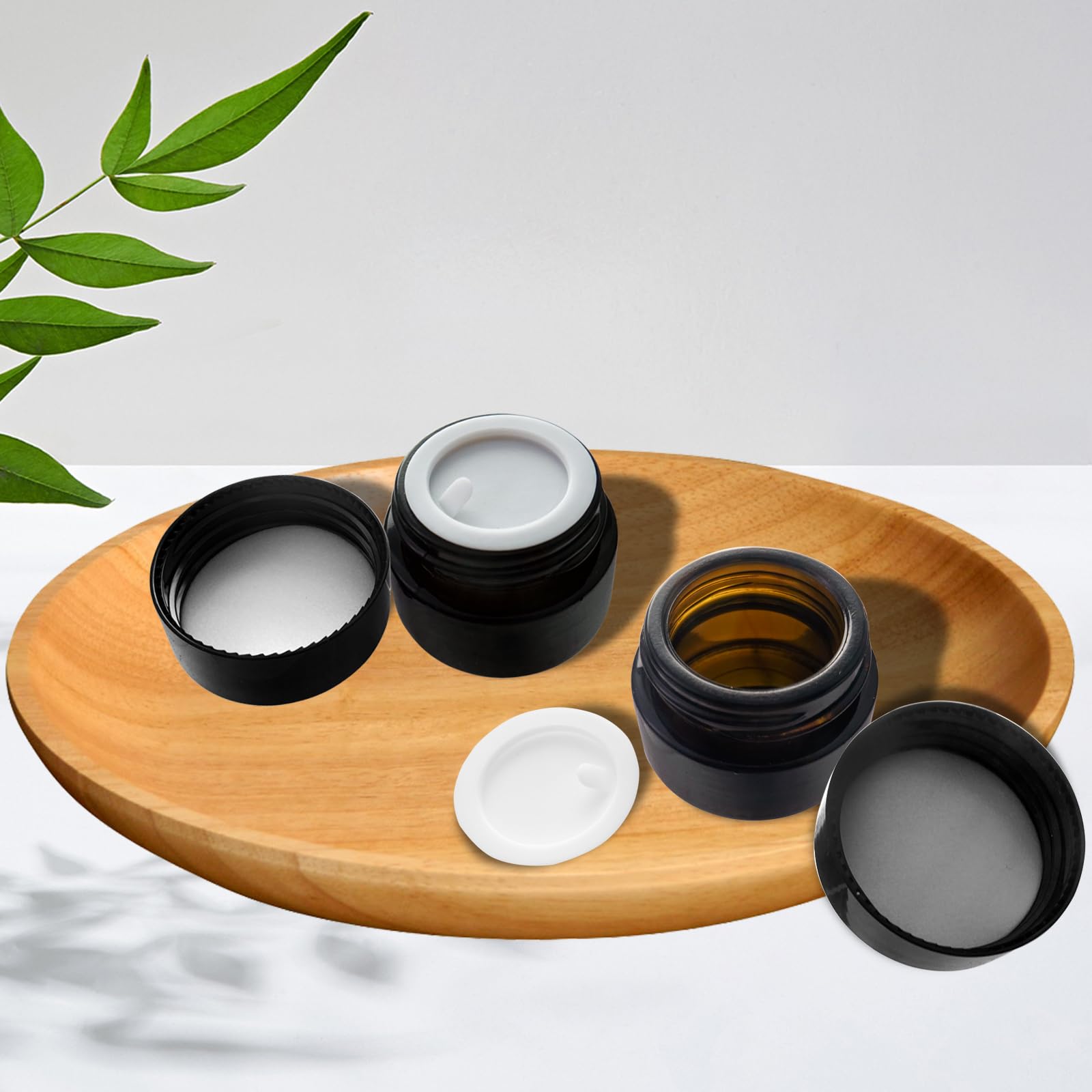 Yishik 2 oz amberkleurige glazen potten, verpakking van 15 lege cosmetische containers van 60 ml met binnenvoeringen en zwarte deksels, navulbare ronde crèmepotten voor lotion, zalven, badzout