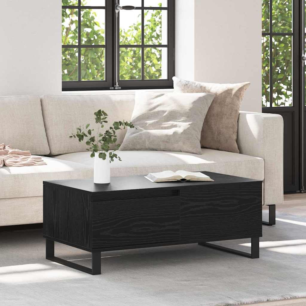 Table basse noire aspect chêne pour optimiser le rangement du salon