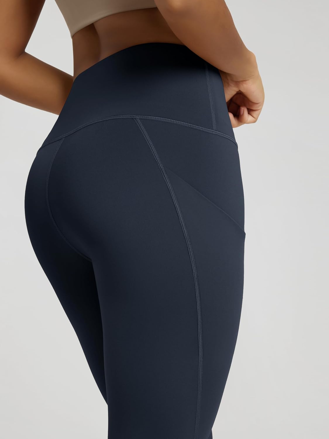 ODODOS Women's High Waisted Yoga Capris with Pockets, Tummy Control Non See Through Workout Athletic Running Capri Leggings thumbnail
