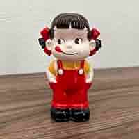 ペコちゃん　貯金箱　陶器 不二家 ペコちゃん 貯金箱 陶器製 - メルカリ