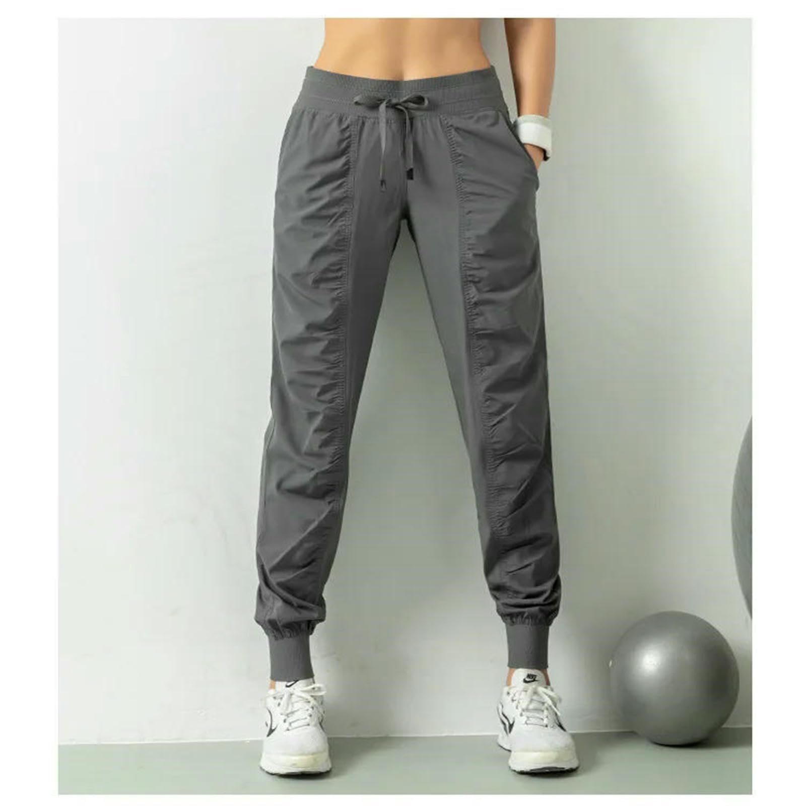 Spodnie damskie plisowane spodnie legginsy fitness spodnie sportowe luźne spodnie ze sznurkiem do biegania na co dzień