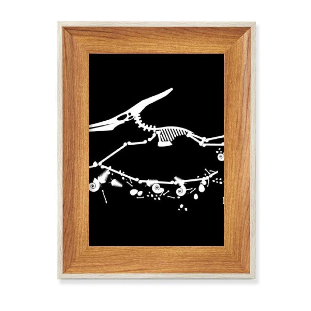 Fossiles de dinosaures miniature en cadre bois de table