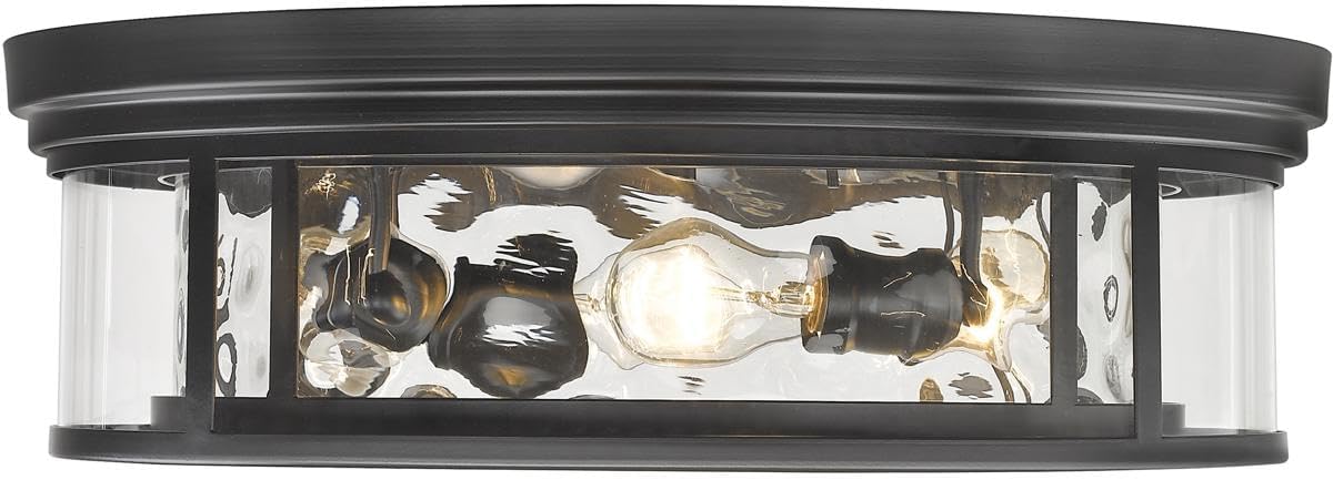 Close-up view of the Z-Lite Clarion Flush Mount Light Fixture, showing the four light sockets and clear glass shade with a textured bottom.