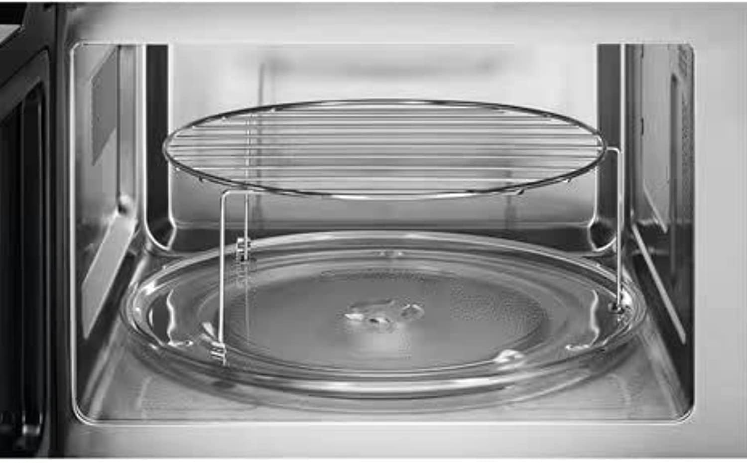 Interiér view of Zanussi ZMC25D59EB Microwave with turntable and grill rack