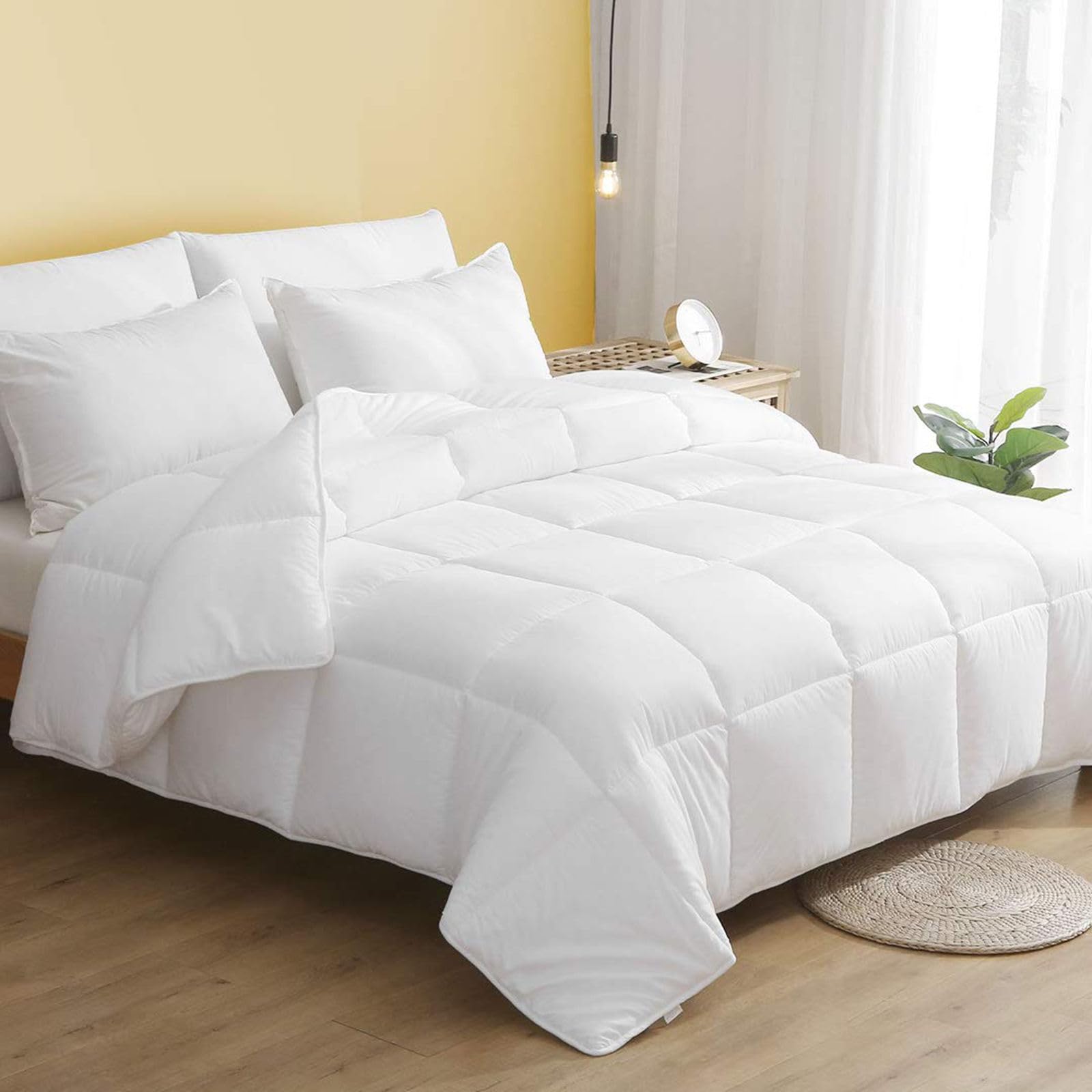 Photo 1 of DWR 100% Cotton Fabric Covered Down Alternative Comforter| Lightweight, Twin (68x88)