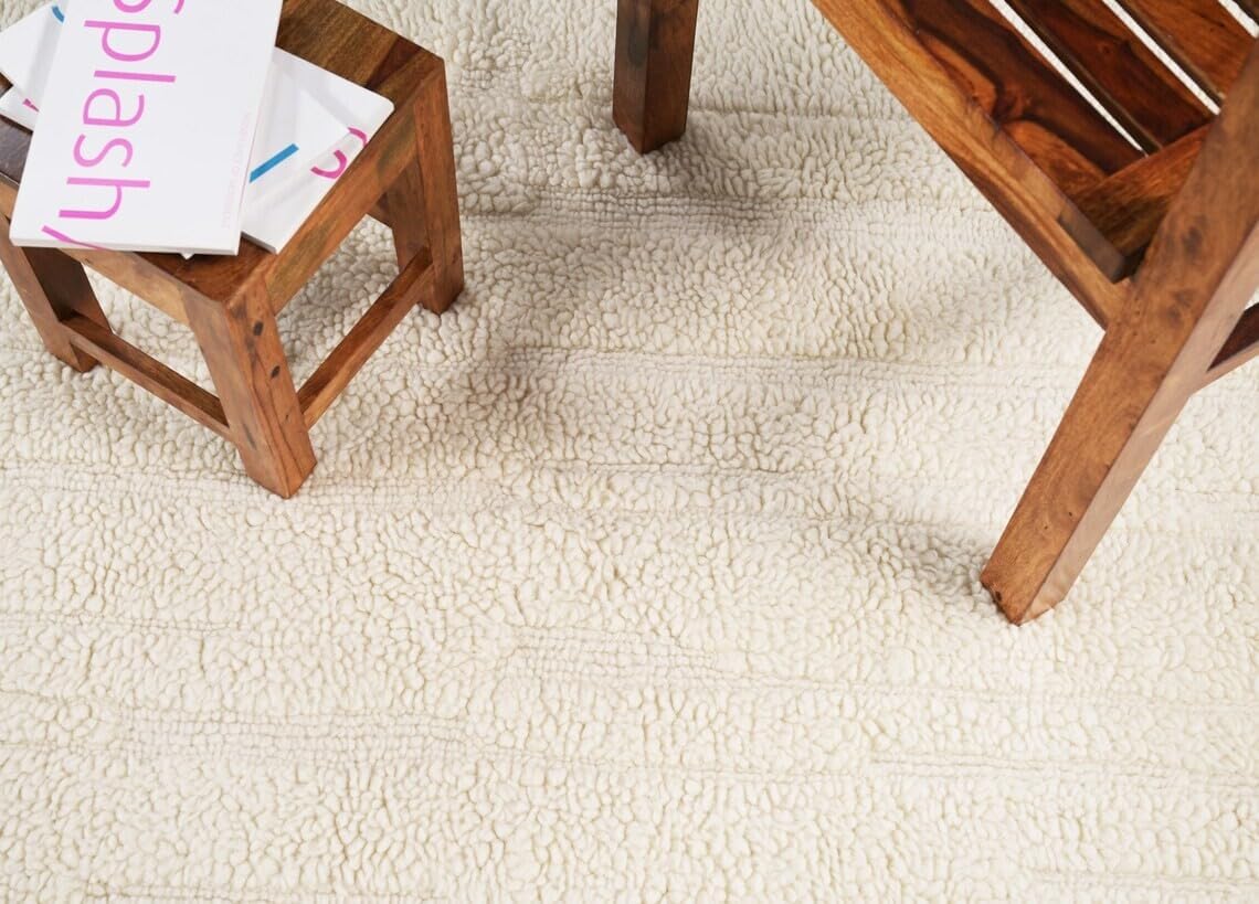Hand Woven Ivory and Beige Rectangular Wool 54 Pounds Modern Minimalist Living Room Area Rug 7.0x10.0