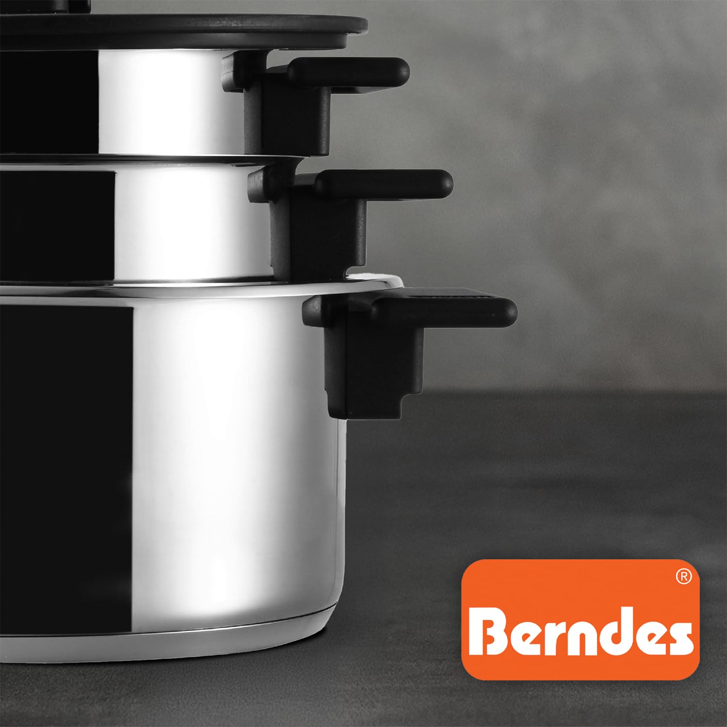 Berndes stapelbares Edelstahl-Topfset 8-teilig Raumwunder l geringer Stauraum l 3x Kochtopf mit Deckel, 1x Dünsteinsatz, 1x Wasserbad oder Rührschüssel l platzsparend l Induktion
