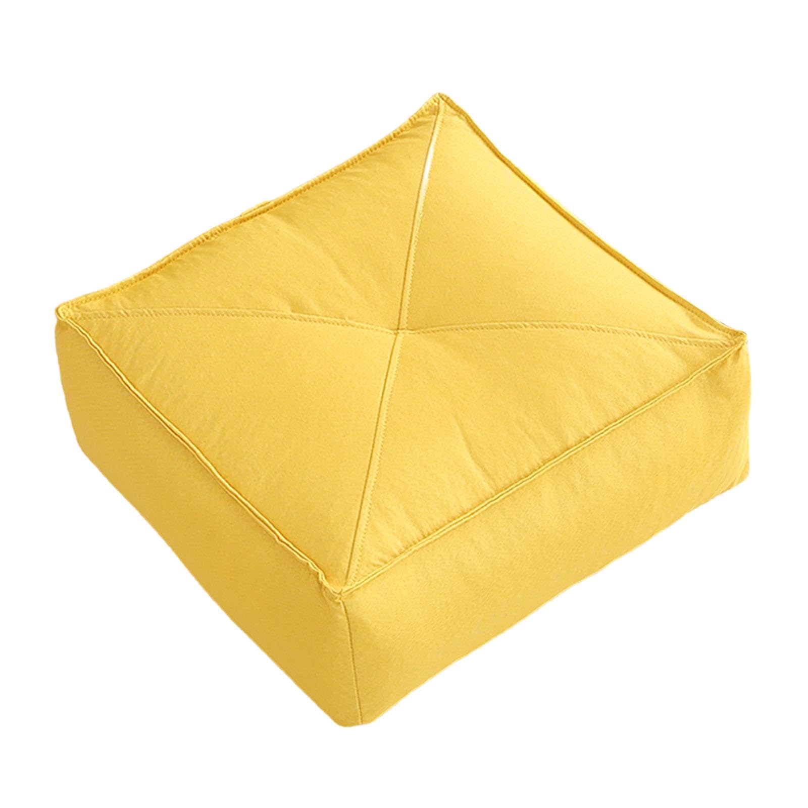 Coussin de sol jaune pour un confort d'assise accru au salon