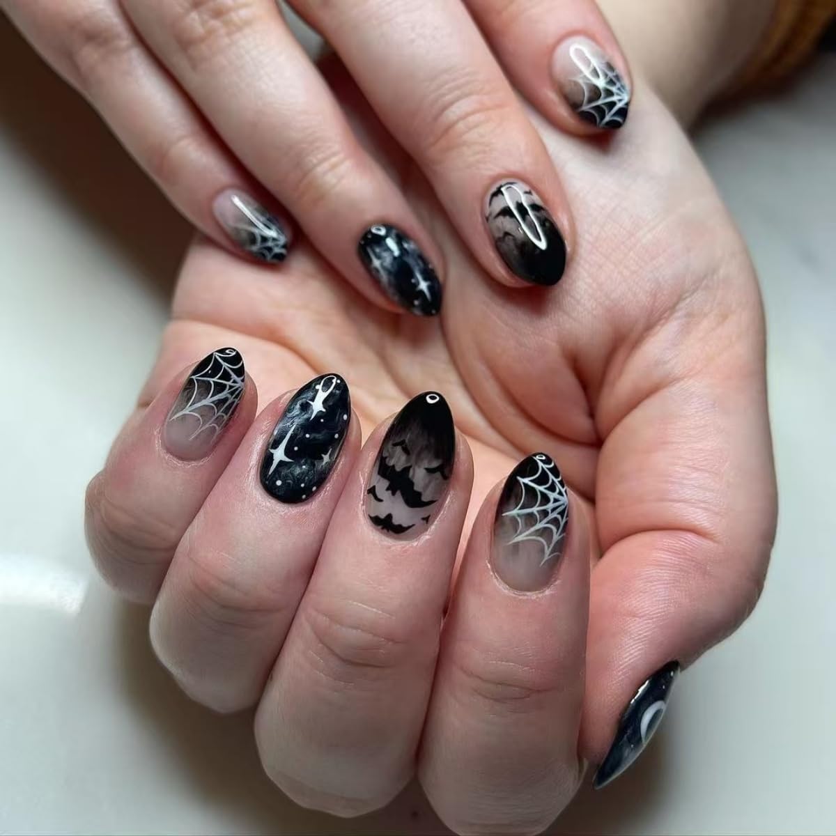 Halloween Press on Nails Short Almond Fake Nails with Spider Web Bat Design Stick on Nails Black Gradient False Nails Goth Reusable Acrylic Glue On Nail for Women Nail Art Decoration 24Pcs