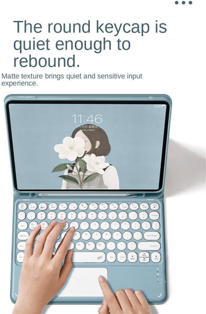 Close-up of the keyboard showing round keycaps and text indicating quiet operation