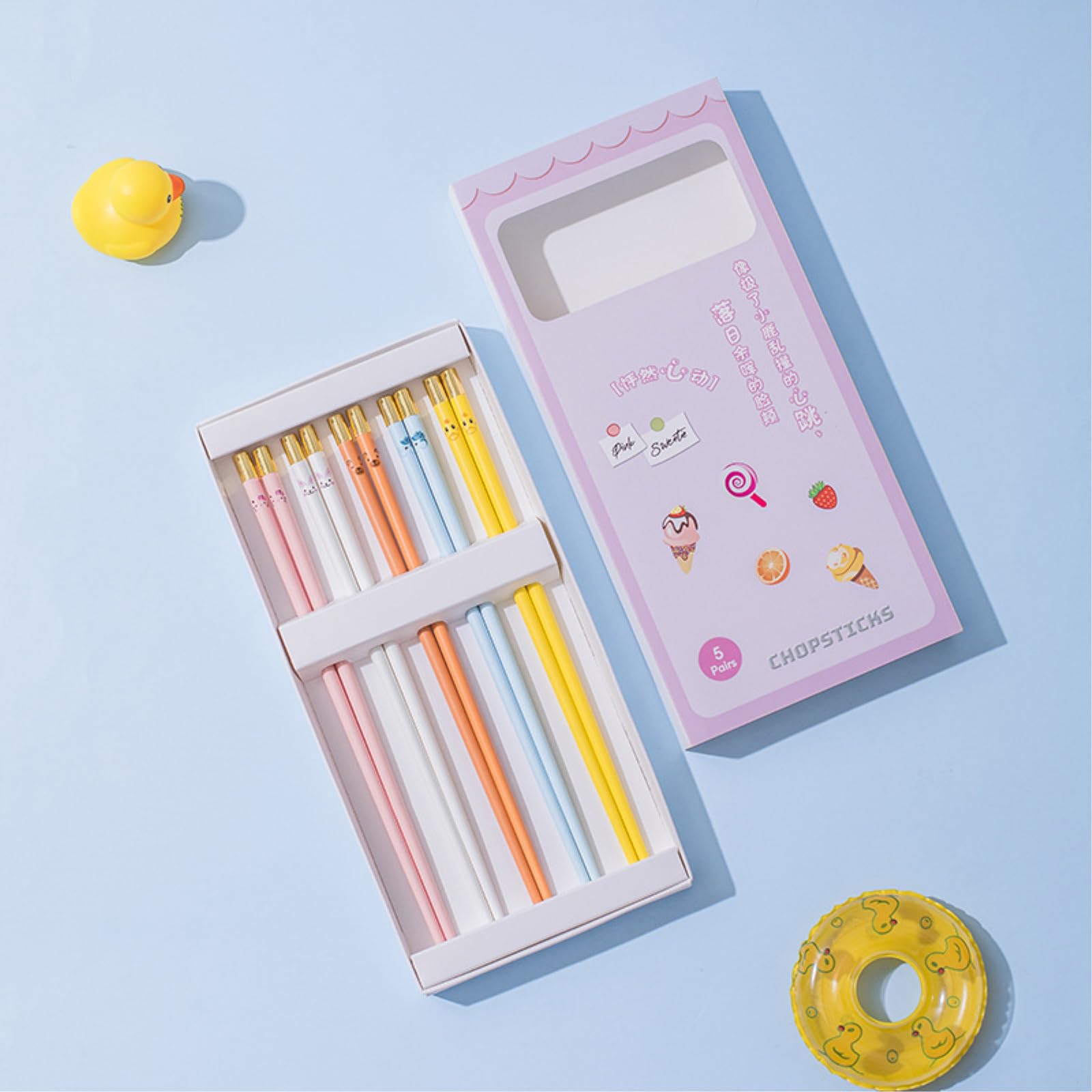 Lot de 2 paires de baguettes en céramique colorées, tête de cere et vaisselle de personnage - Tête dorée